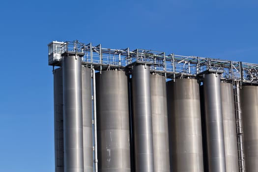 A suite of gas tanks on an industrial field outside Vienna, Austira