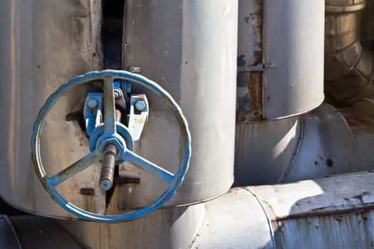 An aged industrial valve in a refinery close to Vienna