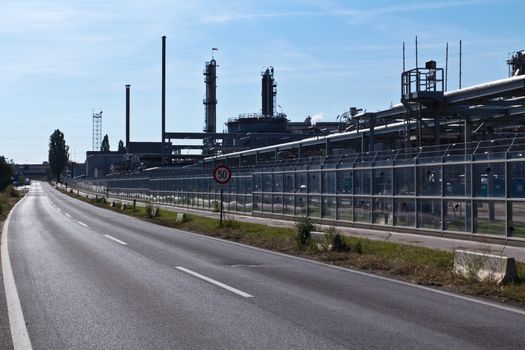 A road passing an industrial area outside of Vienna, Austria.