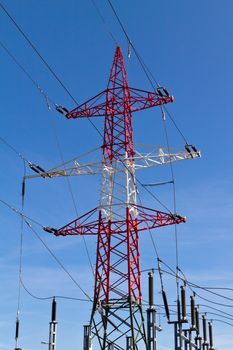 A colorful power pole next to Vienna on a sunny day