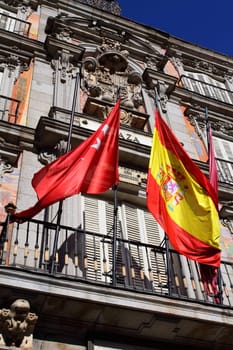 Detail of a decorated facade and balconies at the Palza Mayor, Madrid, Spain. 