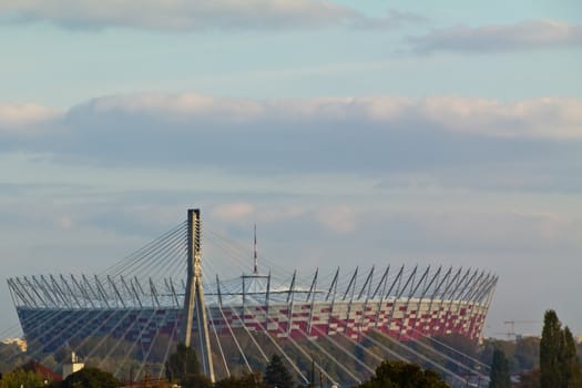 The polish national stadium behind Warsaw's largest bridge