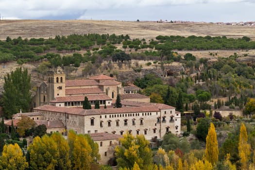 A small castle near Segovia, Spain, almost hidden by the terrain