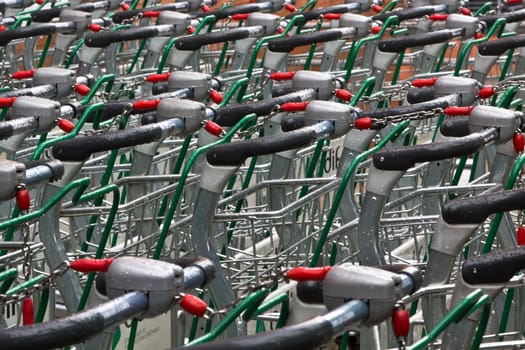 A set of wet trolleys after the rain in Madrid