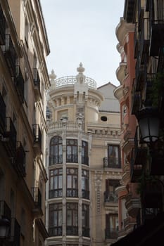 Exterior parts of classical buildings in the center of Madrid