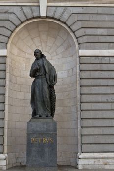 A statue of Petrus, Jesus' disciple, outside the cathedral of Madrid
