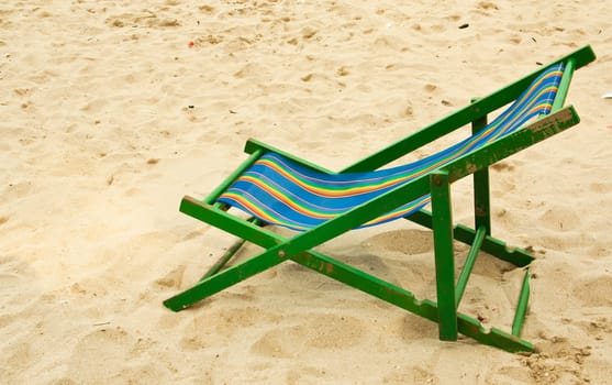 Folding chair  at the beach of the sea.