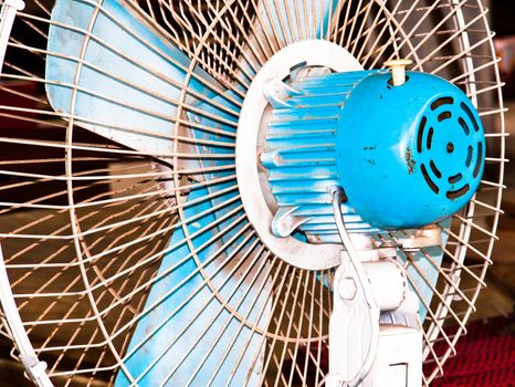 Electric fan, a very old view from the back of the fan.