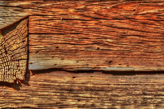 This photo present a fragment of a wooden structure of the building.