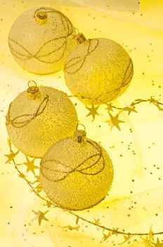 Christmas ball baubles with silver and gold decoration.