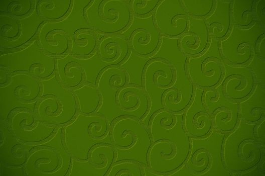 Elegant decorative green textured surface close up.