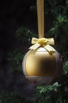 Christmas tree with a christmas ornament.