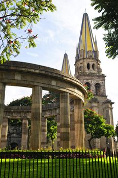 Rotonda de los Jalisciences Ilustres and Cathedral in historic center in Guadalajara, Jalisco, Mexico