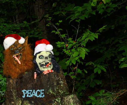 The Grim Reaper and the wolf man celebrating the Holidays together wishing everyone peace on earth.