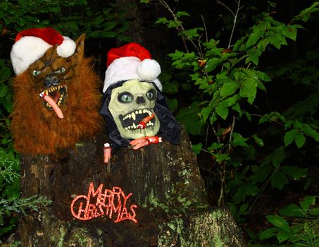 The Grim Reaper and the wolf man celebrating the Holidays together wishing everyone a Merry Christmas.