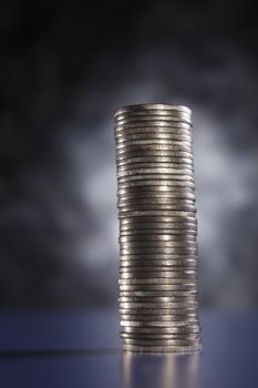 Stack of coins isolated on the background.