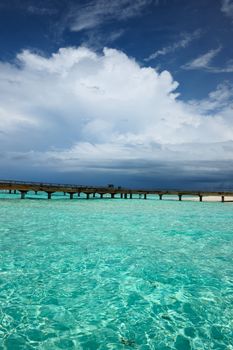 Beautiful beach with jetty at Maldives