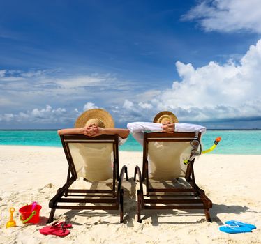 Couple on a tropical beach at Maldives