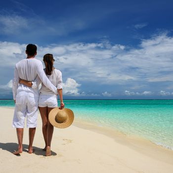 Couple on a tropical beach at Maldives