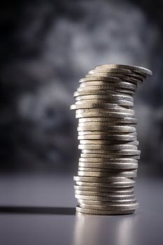 Stack of coins isolated on the background.