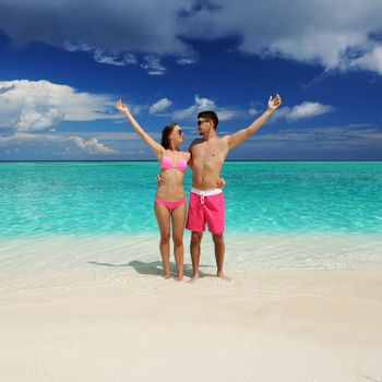 Couple on a tropical beach at Maldives