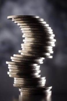 Stack of coins isolated on the background.