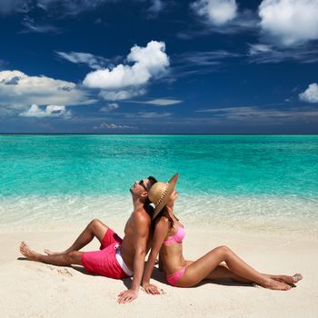 Couple on a tropical beach at Maldives