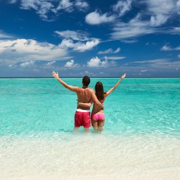 Couple on a tropical beach at Maldives