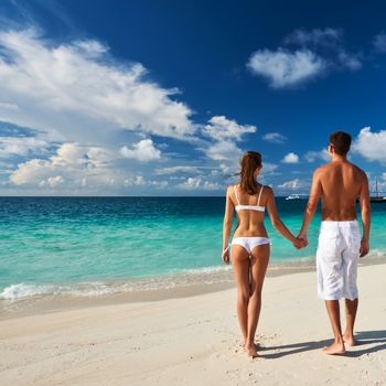 Couple on a tropical beach at Maldives