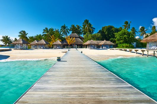 Beautiful beach with jetty at Maldives