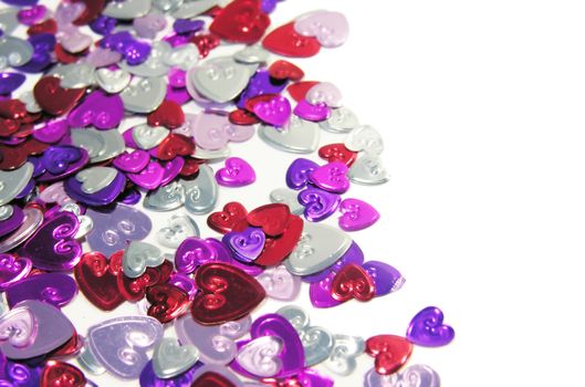 decorative hearts laying on white background