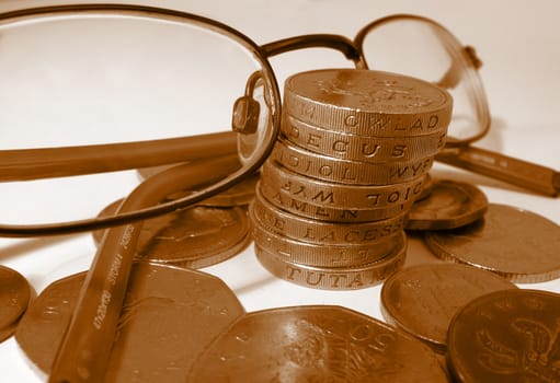 close up of coins and eys glasses