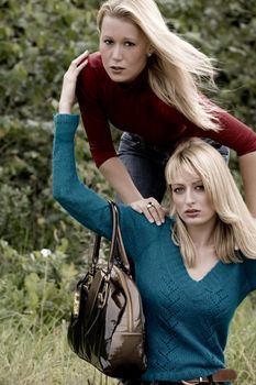 two sisters in a park having fun