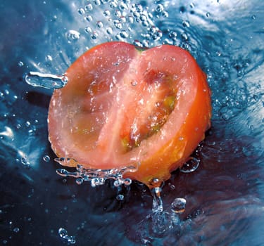 fresh tomato in water