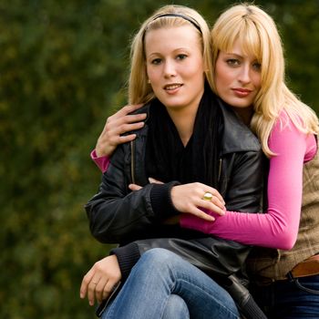 two sisters in a park having fun