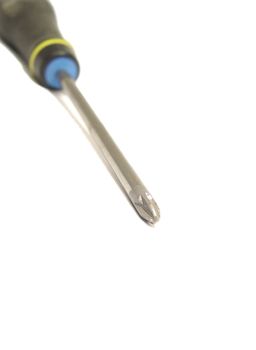 detail of screwdriver over white background