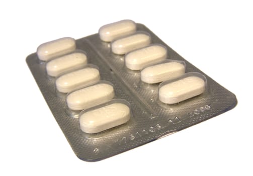 pills marco over white