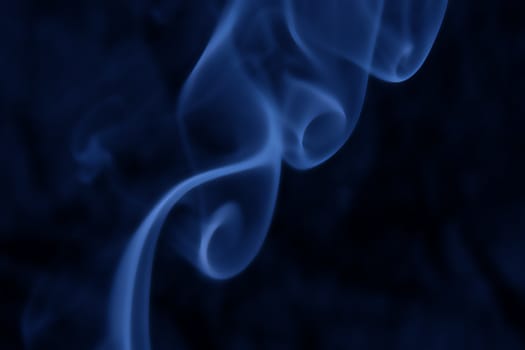 Abstract background of swirling smoke