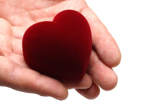 man's hands gifting heart on valentine day isolated on white