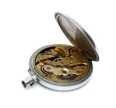 old pocket watch with open cover of gear isolated on white