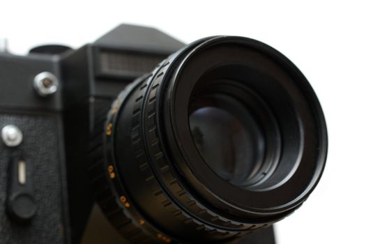 black slr camera with lens close-up isolated on white