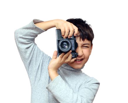 asian boy photographing vertical with black slr camera isolated on white