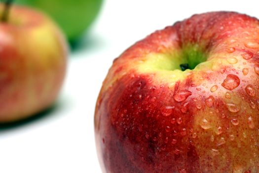 wet apple with water drops close-up