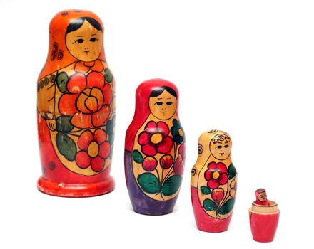 russian wooden dolls row - "matreshka" isolated on white