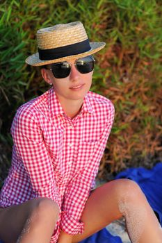 Woman in sunglasses at beach 