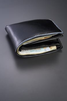 stock image of the wallet full of money