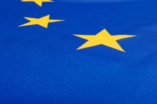 Closeup of Glossy Flag of European Union - EU Flag Drapery
