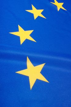 Closeup of Glossy Flag of European Union - EU Flag Drapery
