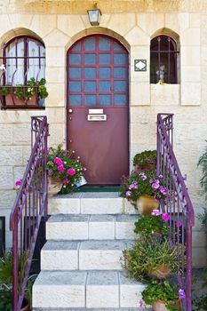 Detail of the Facade of Israel Home Decorated with Flowers