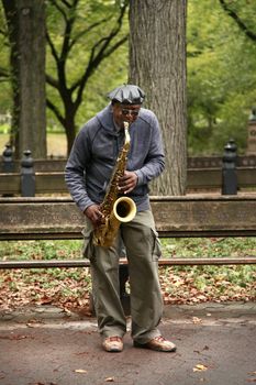 NEW YORK CITY - OCTOBER 9: A saxaphonist busking in Central Park's Bethesda Terrace, a popular tourist attraction October 9, 2012 in New York, NY.